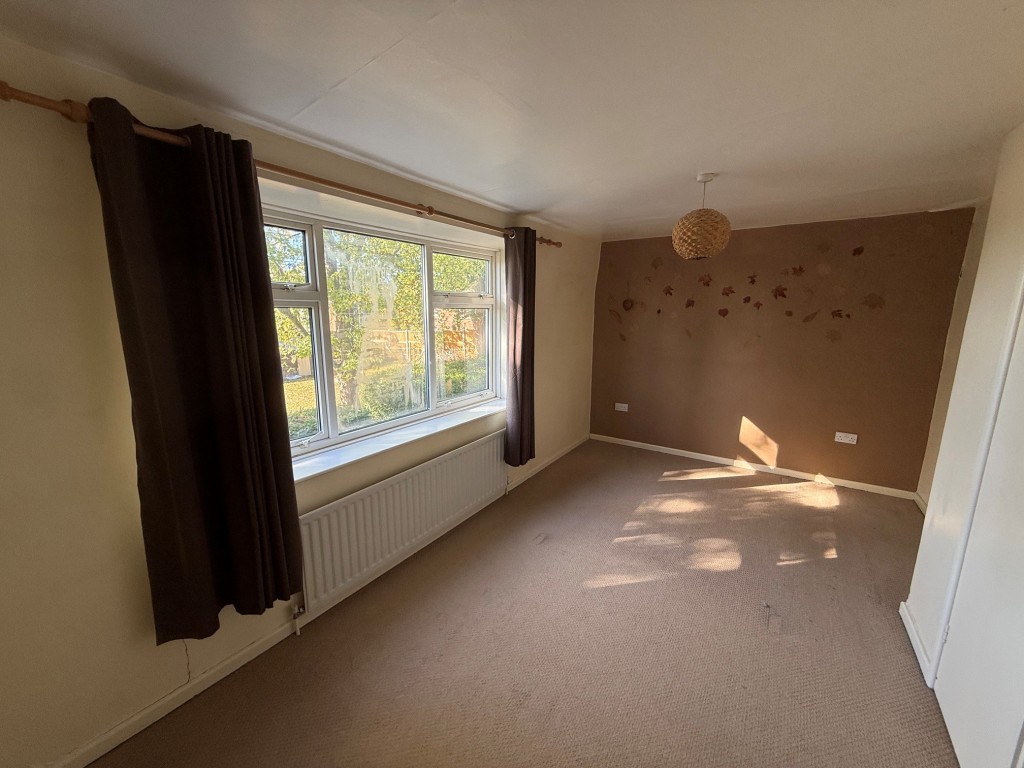Lot: 164 - TWO-BEDROOM SEMI-DETACHED HOUSE FOR IMPROVEMENT AND REPAIR - Bedroom 1 with window to the front